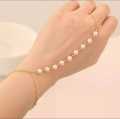 Gold Beautiful Excellent Quality Faux Pearl Bracelet Link Finger Ring Hand Chain Harness Jewelry For Girls / Women. 