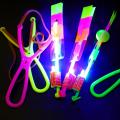 SF Outdoor Shining Rocket Flash LED Light Slingshot Elastic Helicopter Rotating Outdoor Flying Toy Arrow Party Gift Childrens Favor #444684. 
