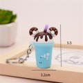 Soft and flexible Cartoon keychain Delightful Attractive packaging Compact size PVC soft rubber Vibrant colors Cute donut for. 
