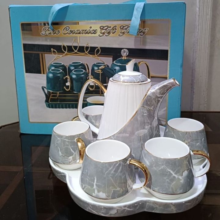 9%20%20Pcs%20Premium%20Quality%20%20Ceramic%20Grey-White-Gold%20Rotating%20Tea%20Set%20(Random%20Print)%20-%20Image%203