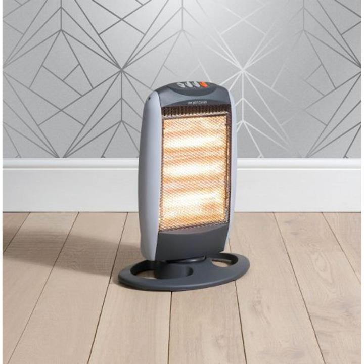 1200 W Portable Halogen Heater With Three Heat Settings & Wide Angle Oscillation (Product of UK)