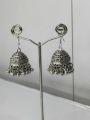 Desi style fine quality silver jhumka; trendy jewelery for party or festive wear. 