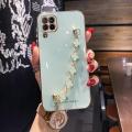 For Samsung Galaxy M33 5G Back Cover with Bracelet Wristband Luxury Clover Chain 6D Plating Frame Shiny Girls Cases Soft Silicone Square Protective Mobile Phone Case. 