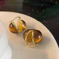 French vintage tiger's eye earrings, feminine light luxury, high-end design earrings, new Maillard earrings. 