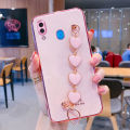 For Samsung Galaxy A20 Back Cover with Love Heart Chain Wrist Strap Fashion Bracelet Shiny Plating Bumper Protective Case Silicone Shockproof Mobile Phone Cases. 
