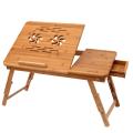 Multipurpose foldable adjustable laptop table stand for bed and sofa with USB cooling fan and drawer. 