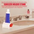 【FUN LIVE】 1Pc Rolling Tube Toothpaste Squeezer Dispenser Stand Holder For Bathroom Plastic Cream Tube Squeezing Dispenser ( Random Color ) By JUST4U. 