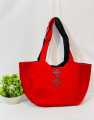 Aare And Mirror Work Embroidered Hand Bag. 