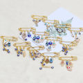 Emotion HENG Lucky Eye Fatima Hamsa Hand Blue Turkish Evil Eye Brooch Pin Gold Color Alloy Charm Brooch for Women Men Fashion Jewelry BE102. 