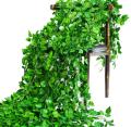 Pack of 1 artificial garland green leaf bail 6.9 ft natural look for decoration artificial flowers. 