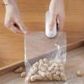 Small Bag Sealer Chips Bag Sealer with Cutter Handheld Bag Sealer 2 in 1 Heat Sealer for Candy Bag. 