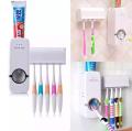 Toothpaste Dispenser with Tooth Brush Holder - White. 