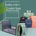 2in1 Multifunctional Travel Mommy Backpack Portable Crib Nappy Bag Large Capacity Diaper Bags  Baby Bed Crib Bag Random Color. 