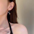Korean fashion diamond studded bow earrings women's autumn and winter niche personality versatile long tassel stud earrings earrings trendy. 