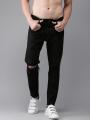 Jet Black Ripped Denim Jeans For Men. 