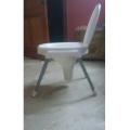 Plastic Material Over The Flush Usage Commode Seat With Four Strong Steel Legs. 