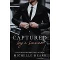 Captured by a Sinner by Michelle Heard. 