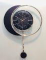 FANCY AND ELEGANT TRANSPARENT GLASS WALL CLOCK ALONG WITH SIDE MOON SHAPE WITH STYLISH LONG PENDULUM  ATTRACTIVE WALL CLOCK STYLISH DESIGN SMOOTH MACHINE WALL CLOCK HANGING WALL CLOCK HOME DECORATION PERFECT FOR YOUR MODERN LIVING ROOM. 