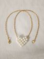 Elegant Golden Chain with Cute Pearl Heart Pendant for Women. 