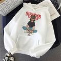 "Hoodie for Girls & Women with Stranger Things Print - Stay Cozy and Stylish with this Trendy Hoodie". 