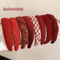 Autumn and winter high-end sense New Year's red headbands women's wide-brimmed pressed hair non-slip headbands Internet celebrity retro hairpins hair bundle headgear. 