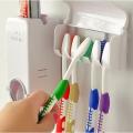 Set of Toothpaste Dispenser & Toothbrush Holder - White Automatic Toothpaste Dispenser and Toothbrush Holder Set  Wall Mounted Toothpaste Dispenser with 5 Toothbrush Holder Set  Toothpaste Squeezing Machine  Toothpaste Dispenser Tooth brush Holder set. 