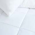 SQUARE QUILTED MATTRESS TOPPER. 