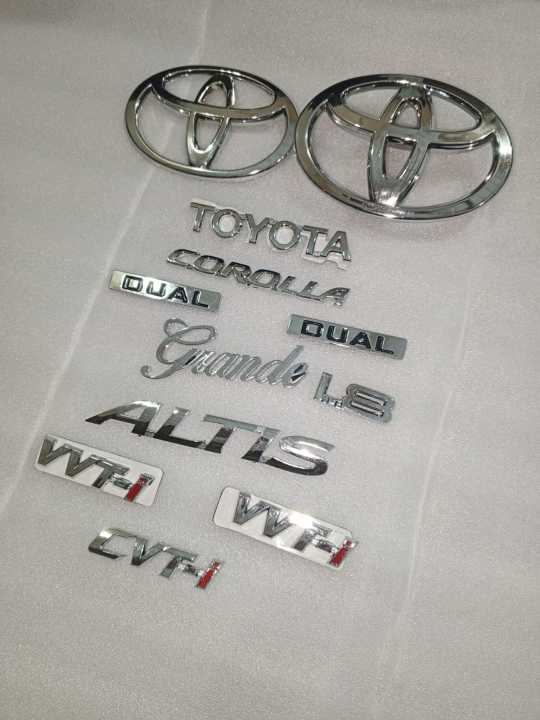 Toyota%20Corolla%20Grande%201.8%202014-2022%20Front%20Logo%20Back%20Logo%20with%20All%20Monogram%C2%A0Complete%C2%A0Set%20-%20Image%202