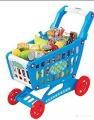 Toy shopping cart with baby toys. 