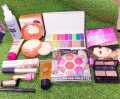 Complete Makeup Collection with Fixer, Double Face Powder, Eye Shadow Palette, Brow Palette, CD Blush, Primer, Foundation Tube, Concealer, Lipstick, and Pencil. 