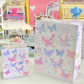 Handle design Butterfly gift bags Elegant Kraft paper material Butterfly print Butterfly treat bags Colorful Bridal goodie bags for Wedding favors Birthday party decorations Baby shower gifts Party. 