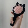 hair comb with back mirror and seamless multicolour rubber band set. 