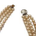Vintage Faux 3 Stand Pearl Necklace | The necklace boasts a classic vintage design. 