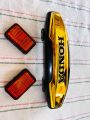 FRONT MONOGRAME AND REFLECTOR HONDA 125,unique,super star ،super power  UNIVERSAL FITTING USE IN ALL BIKES GOLDEN SHADE 70cc+125cc. 