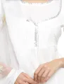 White kalliyan style anarkali frock with plazzo bottom stitched two-piece suit. 