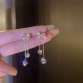 Korean fashion diamond studded bow earrings women's autumn and winter niche personality versatile long tassel stud earrings earrings trendy. 