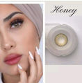 Drizzle style Eye contact lense eye care lense party wear lense in honey shades. 