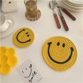 Korean smiley handmade cotton thread woven placemat ins expression insulation pad coaster pot pad cute thick pad. 