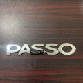 PACK OF 1 TOYOTA PASSO MONOGRAM PLASTIC CHROME EMBLEM. 