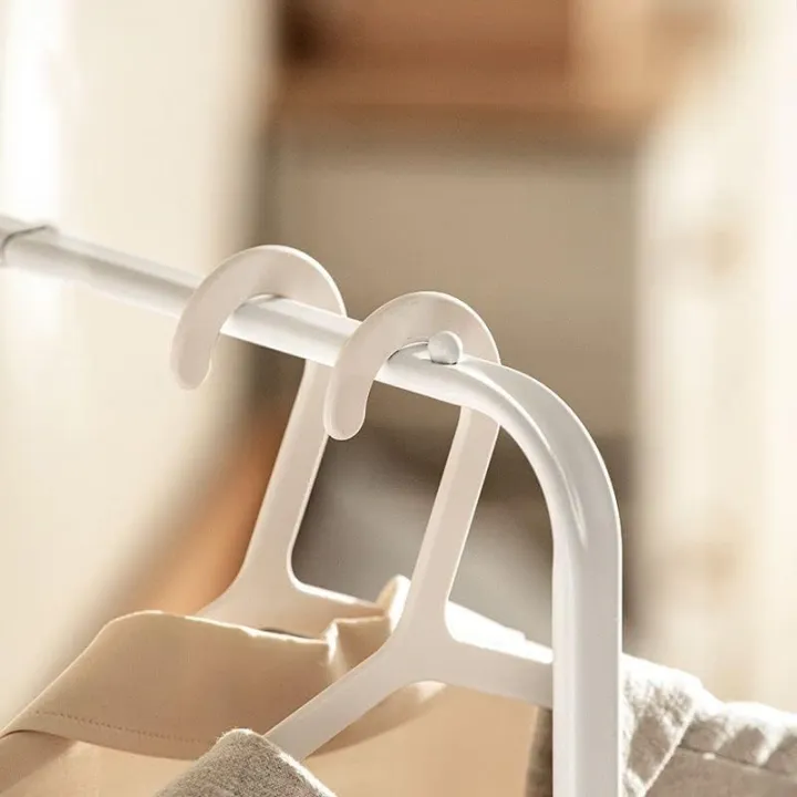 Garment%20Rack%20with%20Shelves,%20Metal%20Cloth%20Hanger%20Rack%20Stand%20Clothes%20Drying%20Rack,%20Multifunctional%20Bedroom%20Hanging%20Rack%20Clothing%20Organizer,%20Modern%20Garment%20Rack%20Clothing%20Stand%20with%202%20Tier%20Metal%20Basket%20and%20Universal%20Wheel%20Square%20Suit%20-%20Image%205