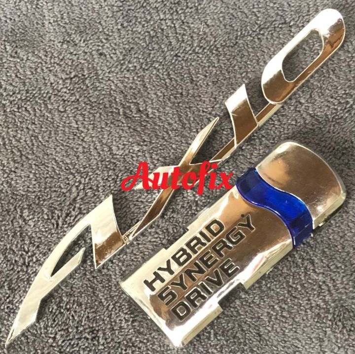 Toyota Axio Hybrid Rear Emblem Silver (Local) 02 PCS | Daraz.pk