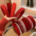 Autumn and winter high-end sense New Year's red headbands women's wide-brimmed pressed hair non-slip headbands Internet celebrity retro hairpins hair bundle headgear. 