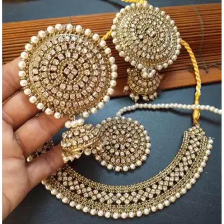 stylish antique set with heavy earrings