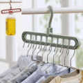 Super Magic Changeable Clothes Pluto Plastic Hanger Space Saving Saver Wonder Closet Organizer 9 Holes Holder Cloths and Pants Hanger. 