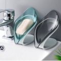 Soap holder for bathroom soap dish modern style and space saving leaf shape soap holder self draining. 