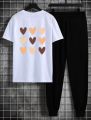 Hearts Printed Sport Set Summer 2-Piece Outfit Short Sleeve T Shirts and Pants Stylish Casual Tracksuit For Women. 