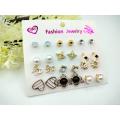 Earrings set of 12 pairs for girls fashion ear rings tops studs. 
