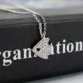 Korean version of light luxury best friend, cute diamond studded fish collarbone chain, trendy temperament, creative small fresh animal pendant for women. 