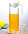 Glass Pitcher 1.1 Liter Jug with Lid Enjoy your favorite beverages featuring a practical lid for easy pouring and storage. Perfect for water, juice, or iced tea, this durable pitcher is an excellent addition to any kitchen. 
