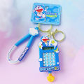 Genuine Doraemon computer keychain, mini handheld calculator, Tinker Bell pendant, student school bag ornament. 